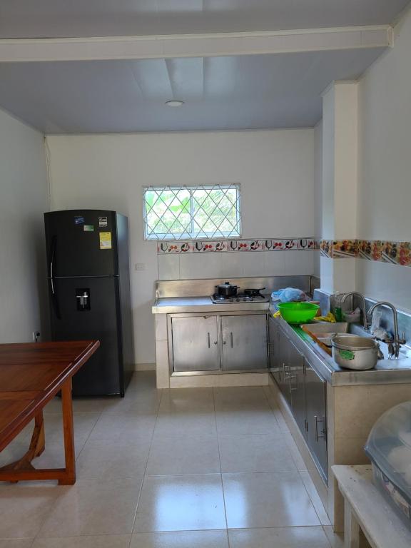 Kuchyň nebo kuchyňský kout v ubytování Olamar Hostal
