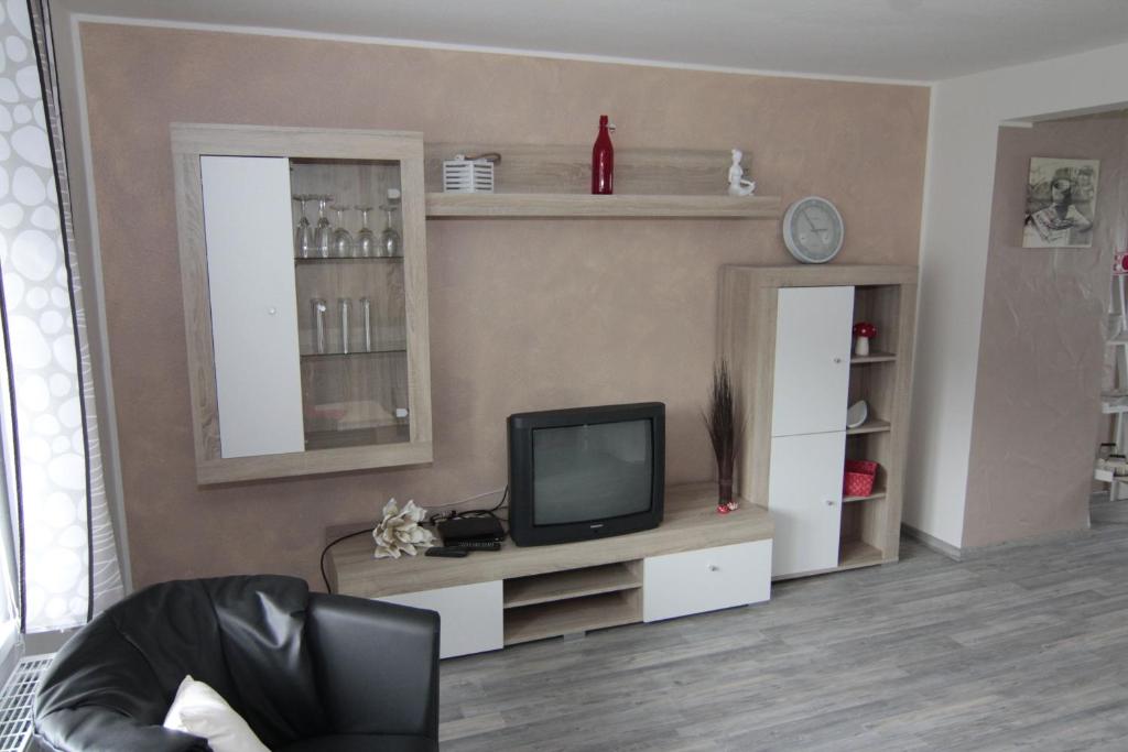 TV a/nebo společenská místnost v ubytování Ferienwohnung Margot