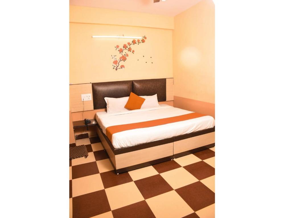 Hotel Bharat Inn, Ajmer 객실 침대
