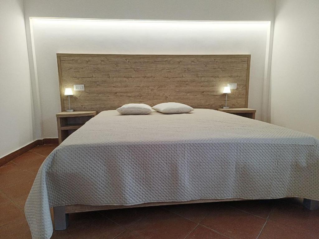 Postel nebo postele na pokoji v ubytování Olive&Sea Villa-OLIVE