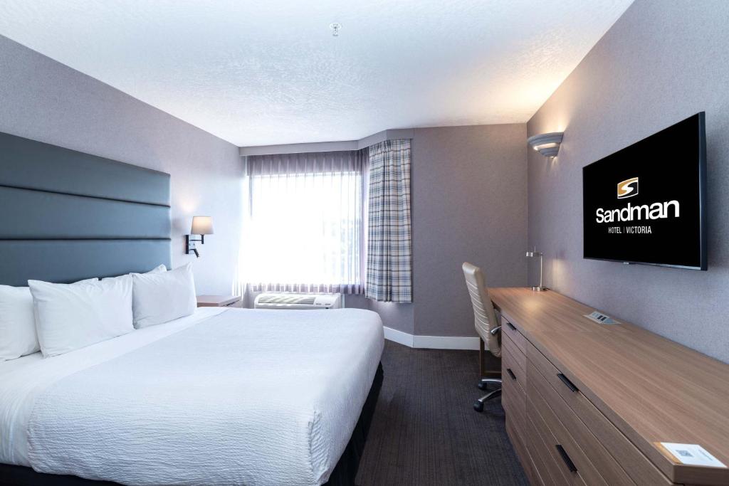TV a/nebo společenská místnost v ubytování Sandman Hotel Victoria