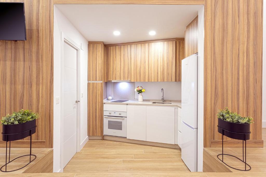 Kuchyň nebo kuchyňský kout v ubytování -MalagaSunApts- CityCenter Spacious Studio