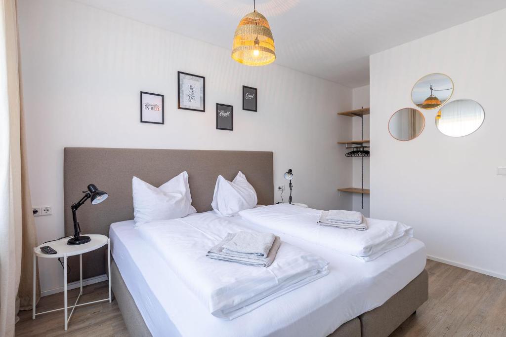 Postel nebo postele na pokoji v ubytování Appartements DAS RETTENBACHER