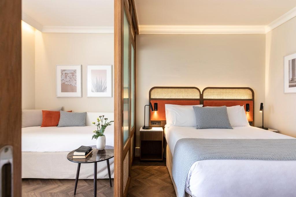Postel nebo postele na pokoji v ubytování Kerkyra Blue Hotel & Spa by Louis Hotels