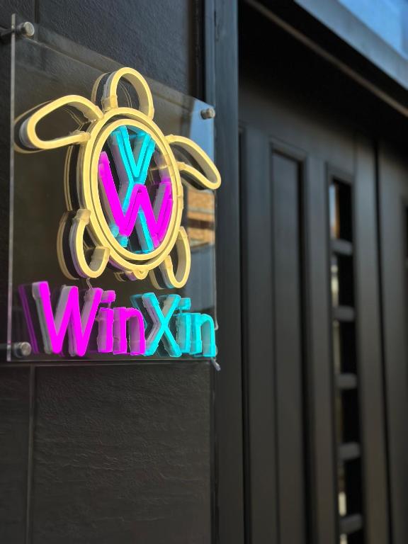 Certifikát, hodnocení, plakát nebo jiný dokument vystavený v ubytování WinXin House