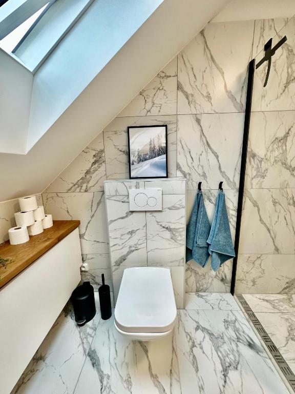 Koupelna v ubytování Molinaro Apartmány Jeseníky
