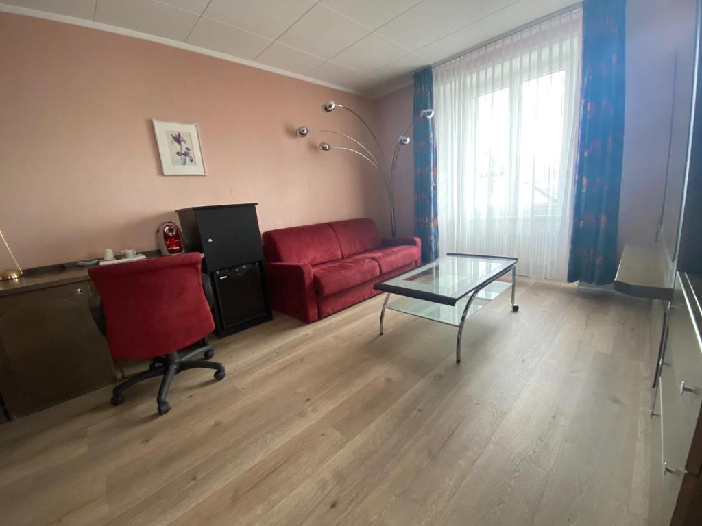 Posezení v ubytování Hôtel de la Gare