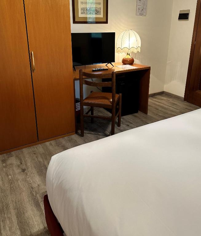 Postel nebo postele na pokoji v ubytování Hotel Park Ge.Al.
