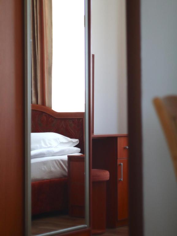 Postel nebo postele na pokoji v ubytování Jansyn Hotel Restaurant