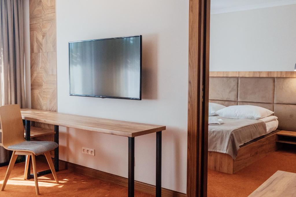 TV a/nebo společenská místnost v ubytování FOREST Family Resort Ustka