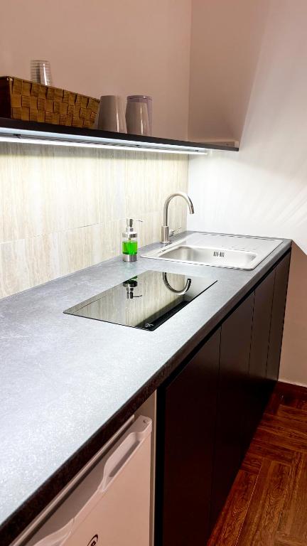 Kuchyň nebo kuchyňský kout v ubytování The Apartment Agrigento