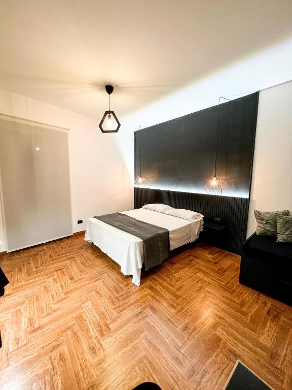 Postel nebo postele na pokoji v ubytování The Apartment Agrigento