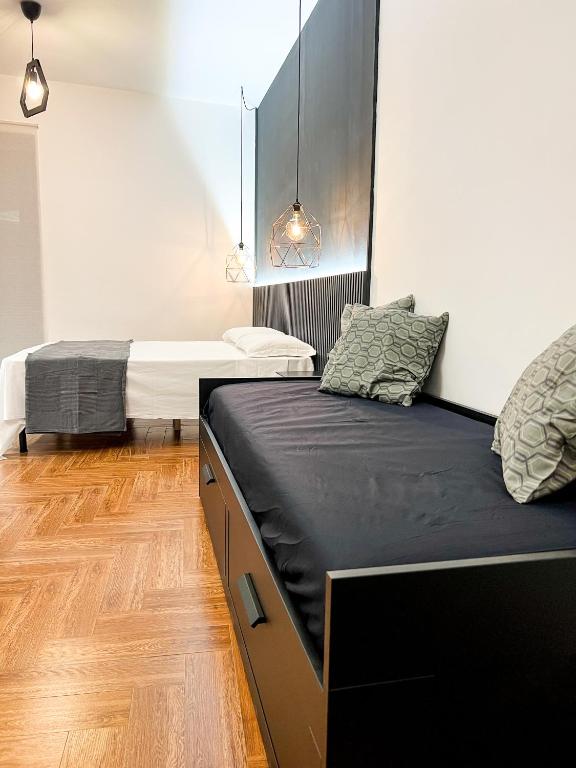 Postel nebo postele na pokoji v ubytování The Apartment Agrigento