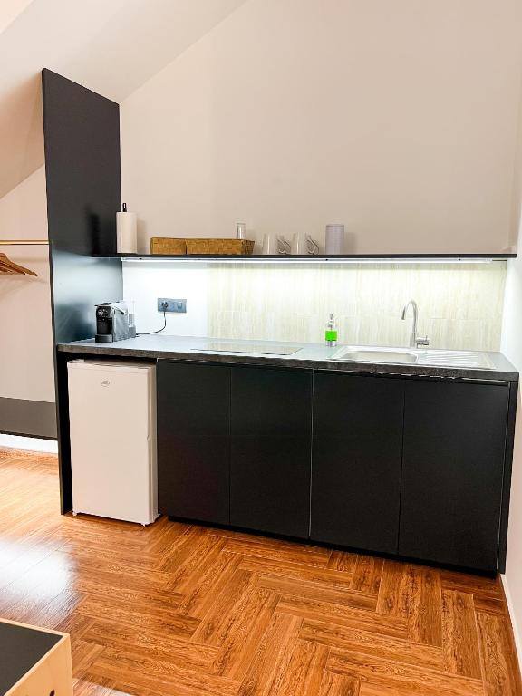 Kuchyň nebo kuchyňský kout v ubytování The Apartment Agrigento