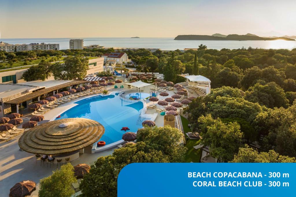 an aerial view of a resort with a swimming pool at Valamar Tirena Hotel in Dubrovnik