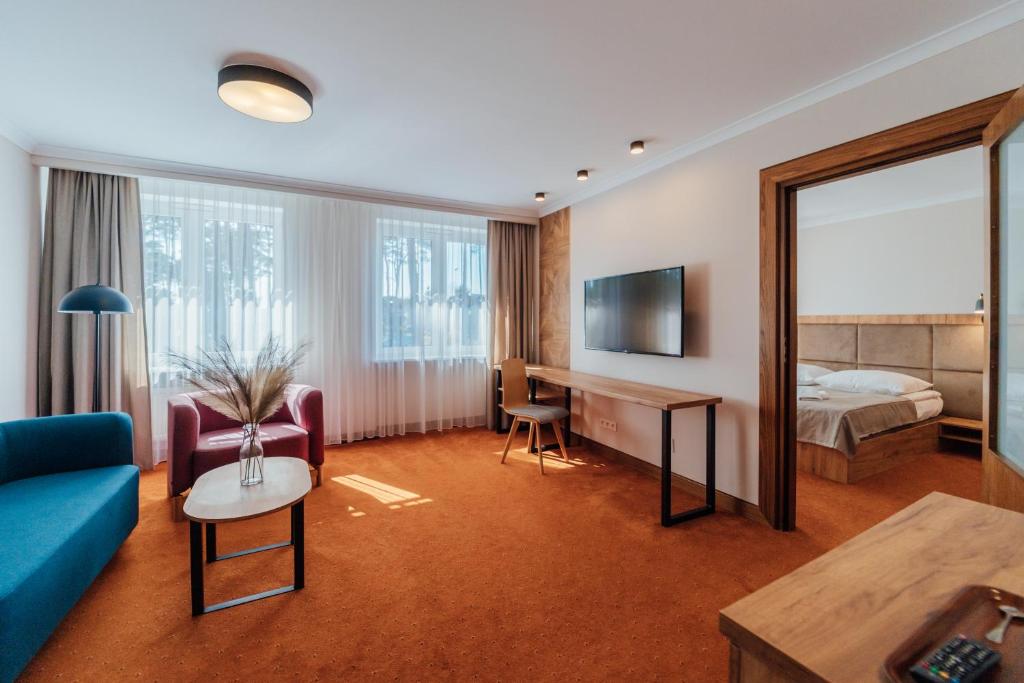 TV a/nebo společenská místnost v ubytování FOREST Family Resort Ustka