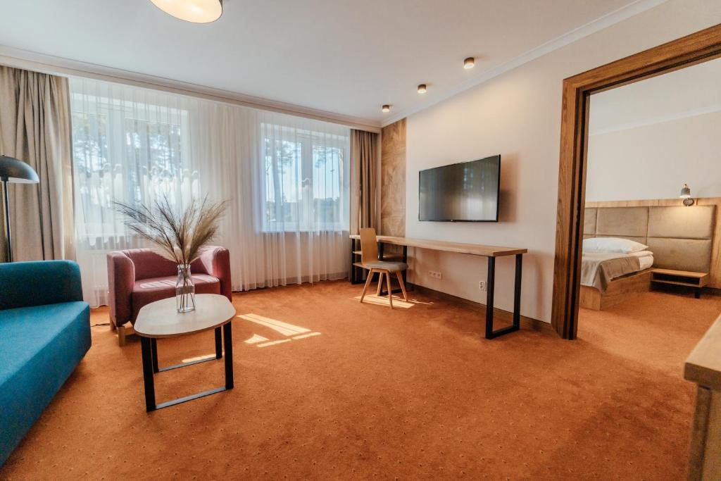 TV a/nebo společenská místnost v ubytování FOREST Family Resort Ustka