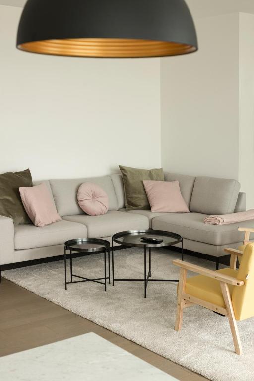 Area soggiorno di UNIEK appartement - mooiste en hoogste uitzicht op Antwerpen! - incl gratis parking