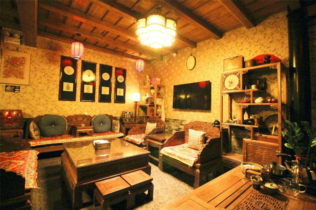 Posezení v ubytování Pingyao Hu lu wa Home Inn