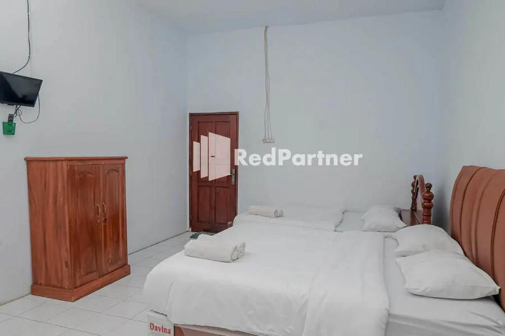 Pondok Damai Guest House Syariah Mitra RedDoorz - Chambre Familiale