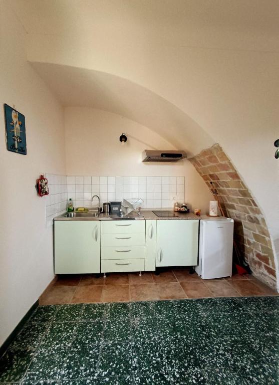Kuchyň nebo kuchyňský kout v ubytování B&B La Ciammaruca