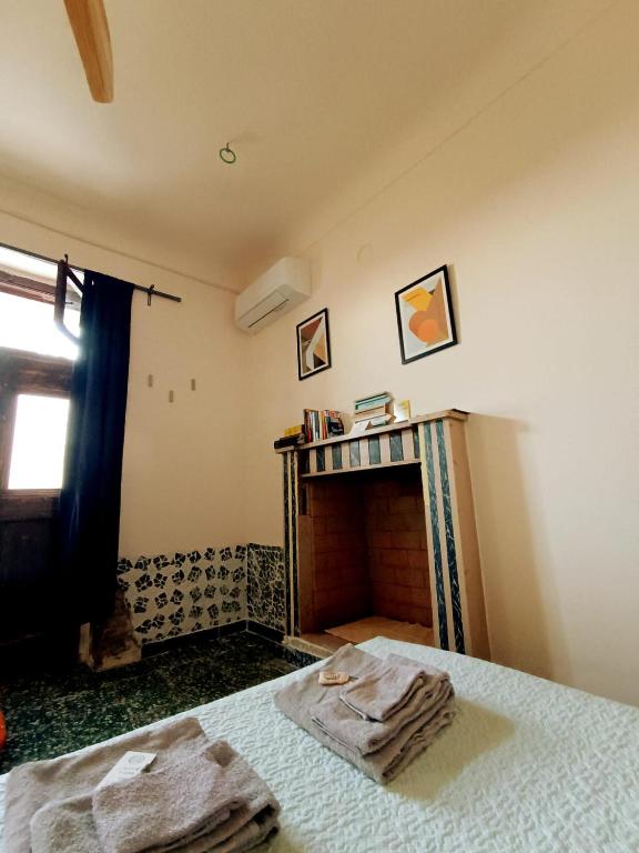Postel nebo postele na pokoji v ubytování B&B La Ciammaruca