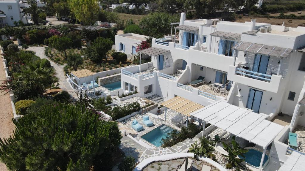 an aerial view of a villa with a swimming pool at Annio studios in Plaka