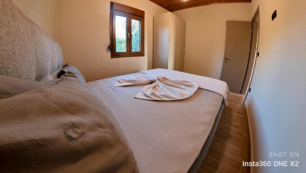 Postel nebo postele na pokoji v ubytování Villa Potamia