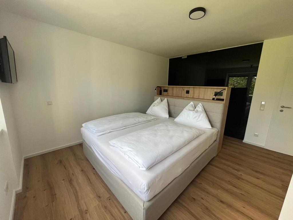 Postel nebo postele na pokoji v ubytování Villa Turnersee