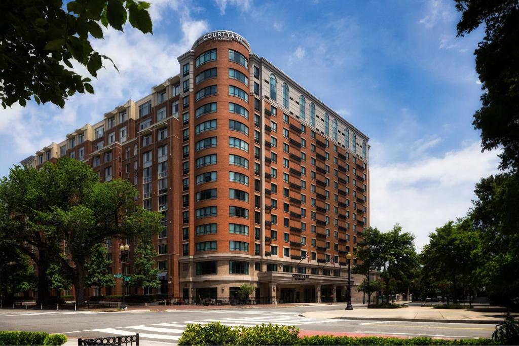 a tall red building with a lot of windows at Courtyard by Marriott Washington Capitol Hill/Navy Yard in Washington