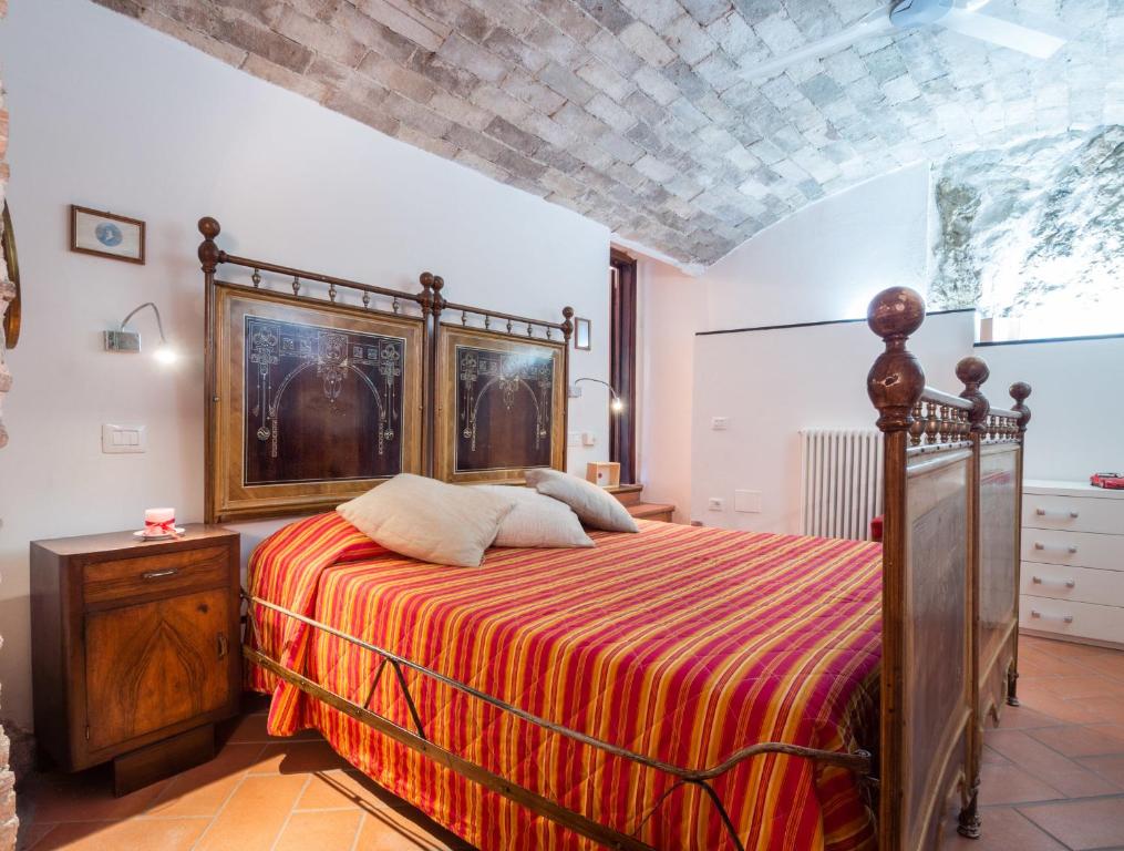 Postel nebo postele na pokoji v ubytování La Loggia Sul Nera