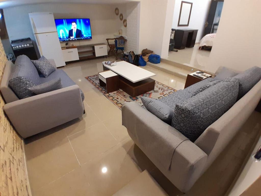 TV a/nebo společenská místnost v ubytování MK2 - One Bedroom Apartment