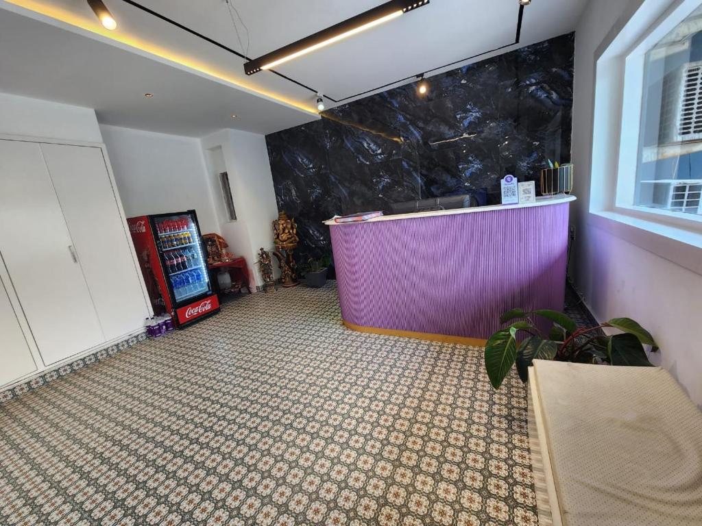 Postel nebo postele na pokoji v ubytování Square9 - A Boutique Hotel