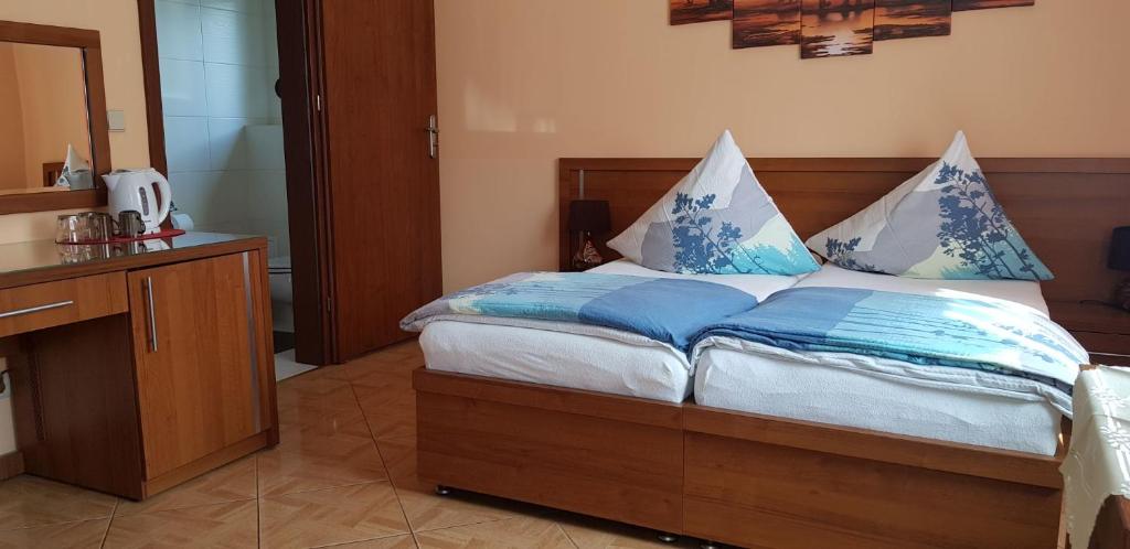 Postel nebo postele na pokoji v ubytování Villa Carmen