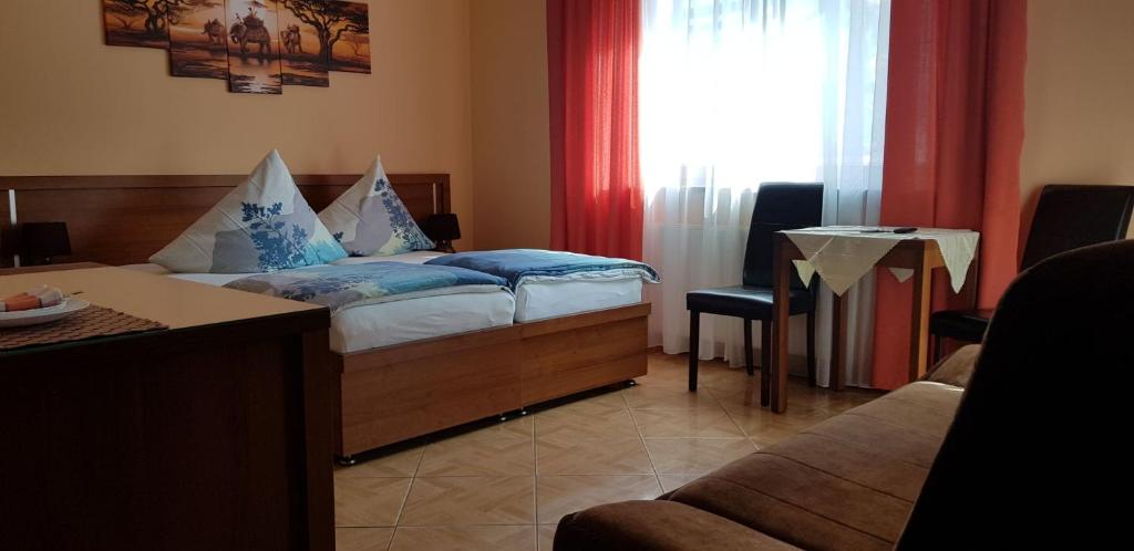 Postel nebo postele na pokoji v ubytování Villa Carmen