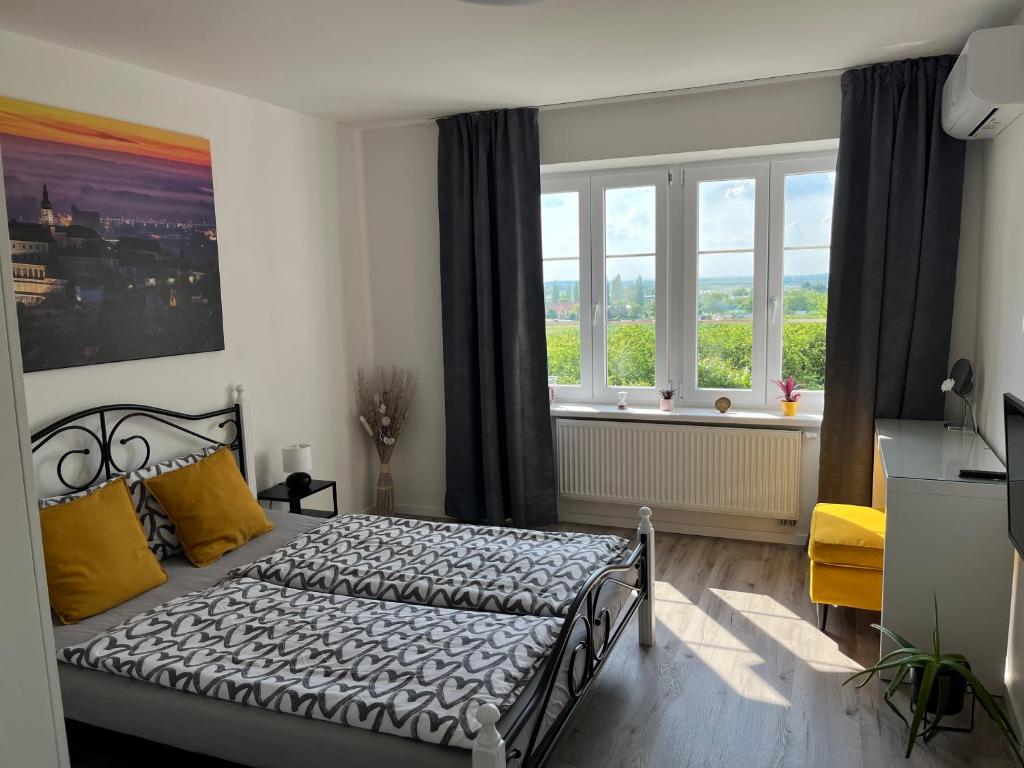 Postel nebo postele na pokoji v ubytování Apartmán u Vítka