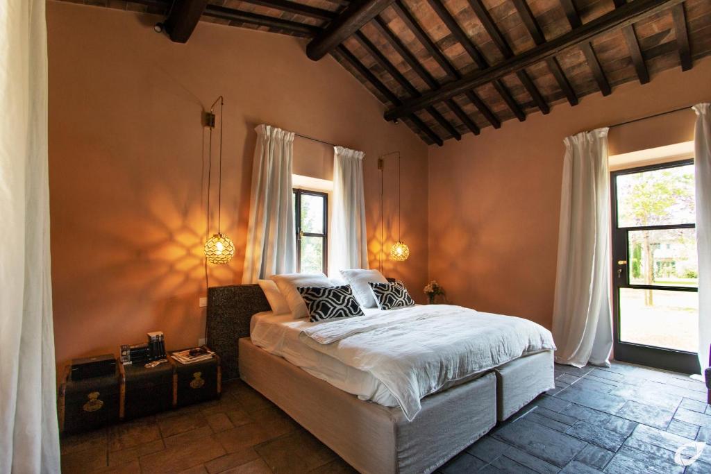 Voodi või voodid majutusasutuse Tenuta del Podestà villa di charme toas