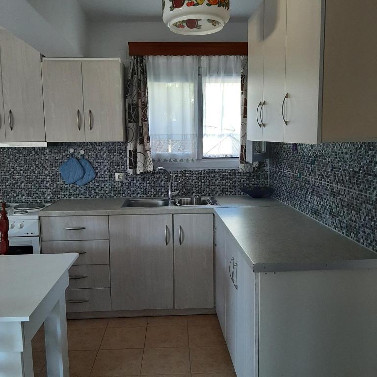 Kuchyňa alebo kuchynka v ubytovaní Ada's House