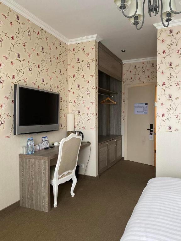 TV a/nebo společenská místnost v ubytování Ambassadori Kachreti Golf Resort