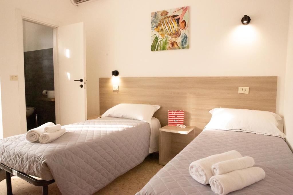 Postel nebo postele na pokoji v ubytování Villa Ella by Interlux