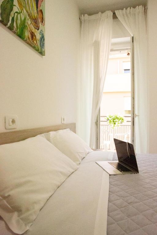 Postel nebo postele na pokoji v ubytování Villa Ella by Interlux