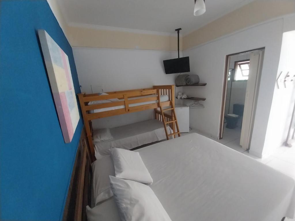 Cama ou camas em um quarto em Pousada Brilho De Paraty