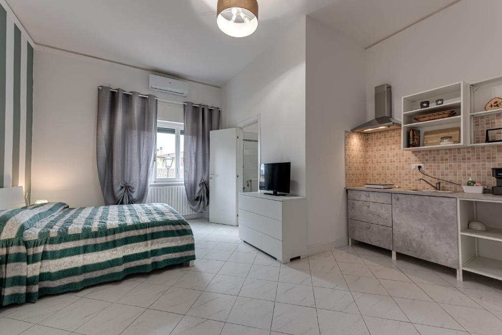 Kuchyň nebo kuchyňský kout v ubytování Ursa Apartment