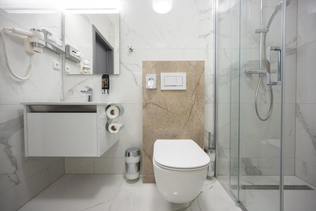 Koupelna v ubytování Hotel Barborský dvůr