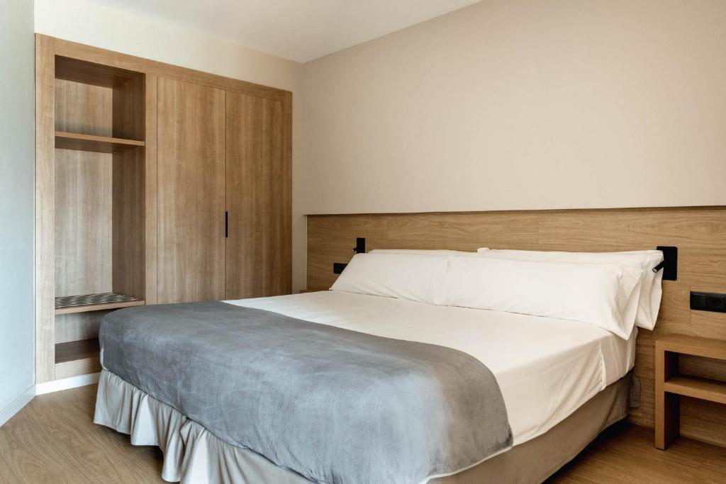 Postel nebo postele na pokoji v ubytování Hotel Terradets