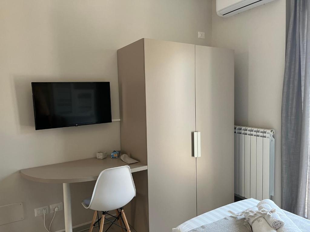 TV a/nebo společenská místnost v ubytování B&B L’ALTRAMURGIA