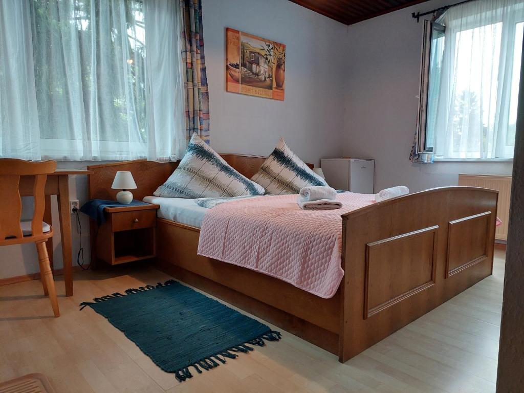 Posteľ alebo postele v izbe v ubytovaní Pension Welserhof