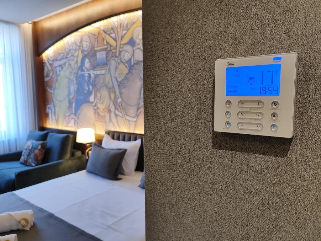 Postel nebo postele na pokoji v ubytování Orienta Hotel Gyumri