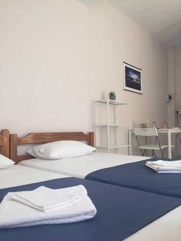 Posteľ alebo postele v izbe v ubytovaní Lysandros Apartments in Athens, near the METRO