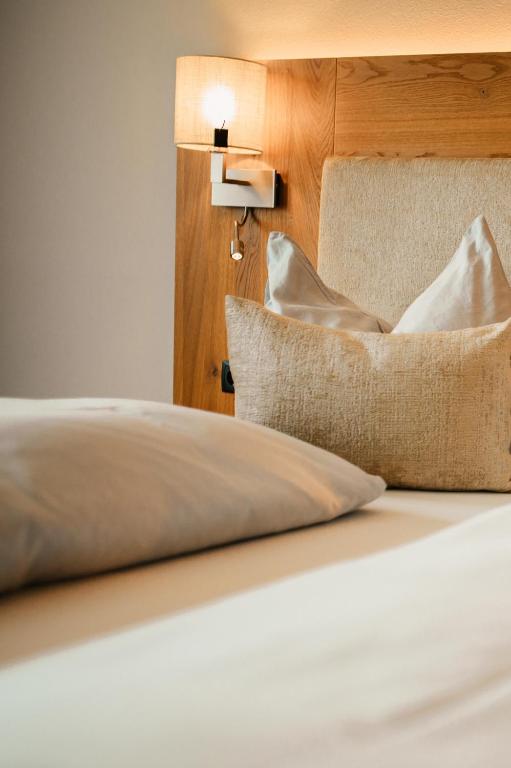 Postel nebo postele na pokoji v ubytování Hotel Schützenhof